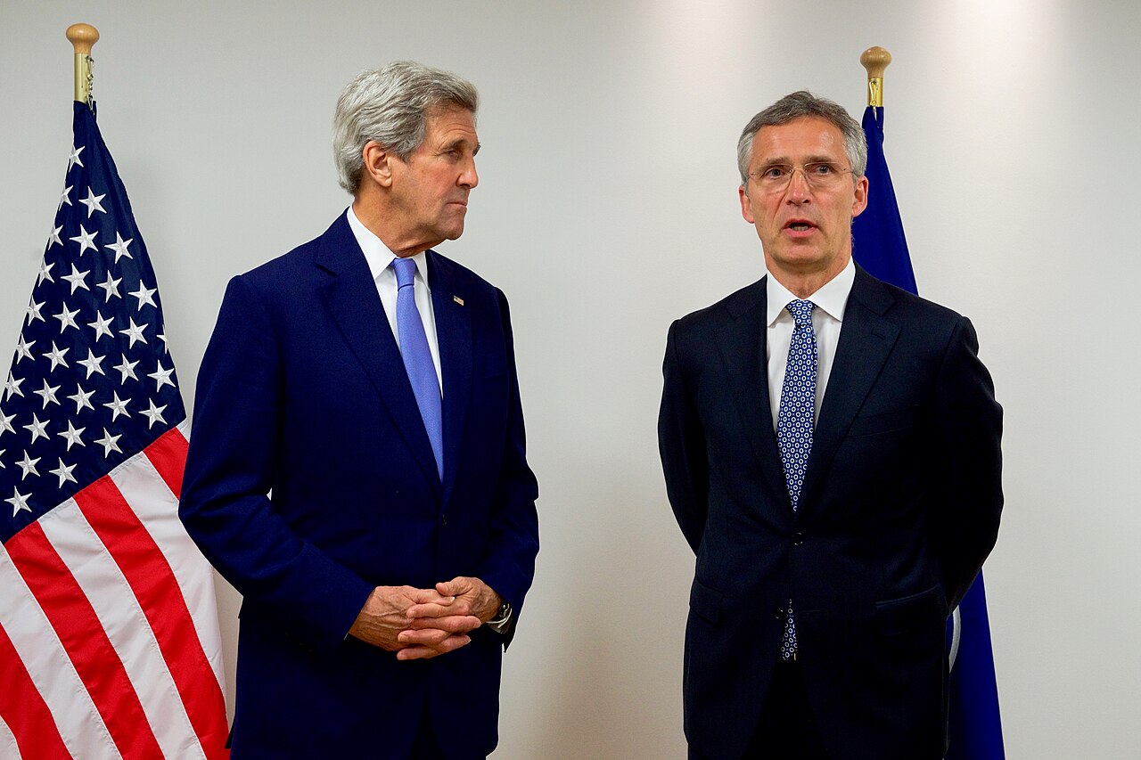 U.S. Secretary of State John Kerry stands with North Atlantic Treaty Organization Secretary-General Jens Stoltenberg as he addresses reporters at NATO Headquarters in Brussels, Bel