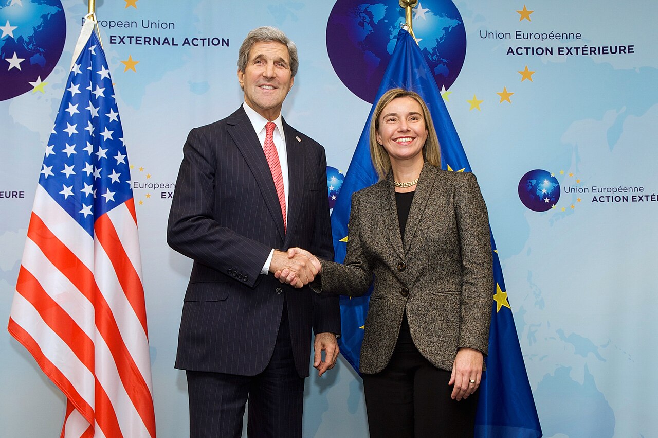 U.S. Secretary of State John Kerry and European Union High Representative for Foreign Affairs Federica Mogherini pose for photographers at the outset of a wide-ranging meeting on D