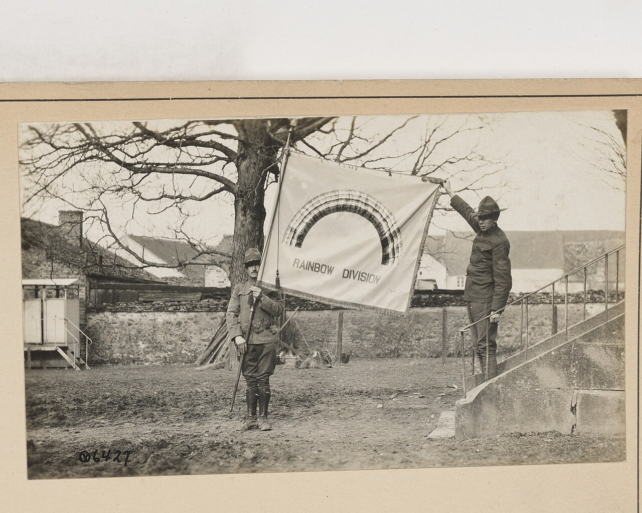 Scope and content: Sgt Price and Master Engineer Hudson holding flag, Rolampont, France