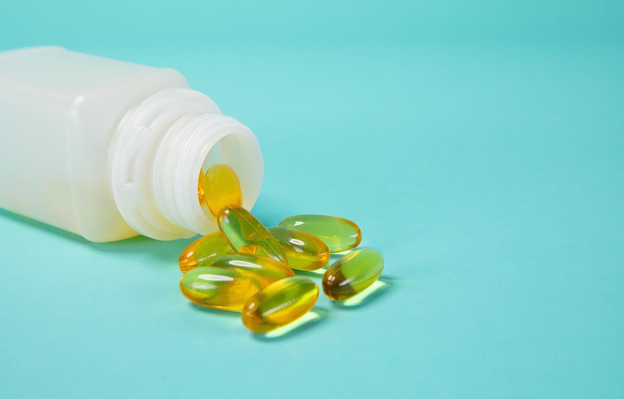Omega 3 capsules in white bottle