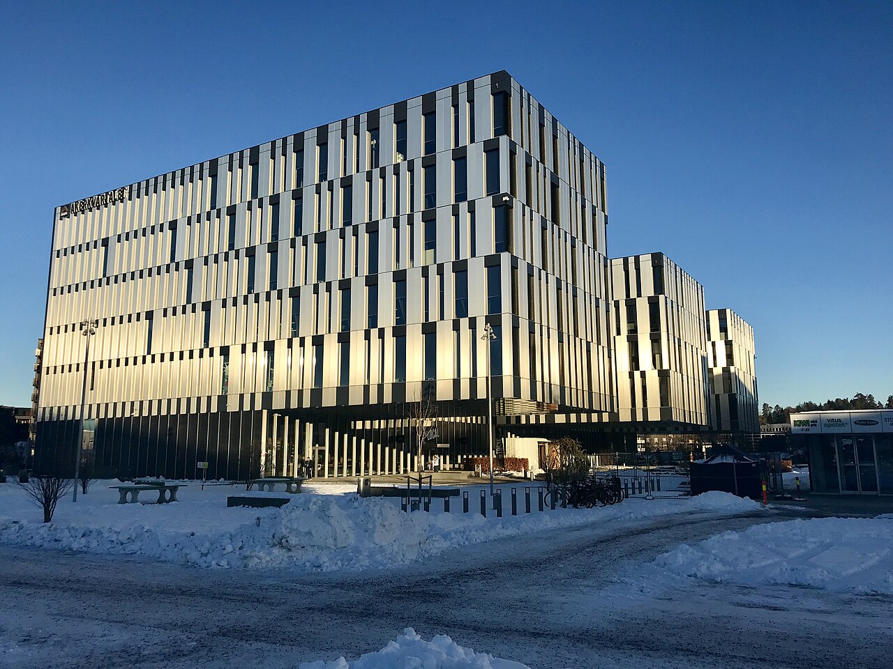 The westmost building of the two Akerkvartalet buildings in Fornebu west of Oslo holds offices for Kvaerner, Aker BP ASA, Aker biomarine, Jaguar Landrover Norge, Cognite, Acastor a