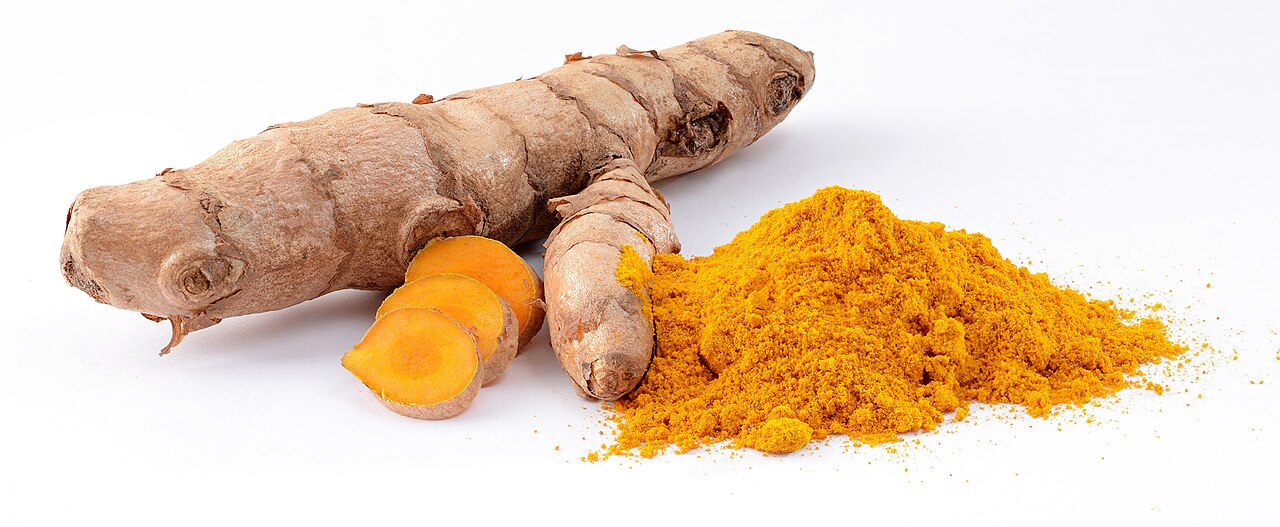 Turmeric (Curcuma longa): fresh rhizome and powder. Stack of 5 images, combined with CombineZP .