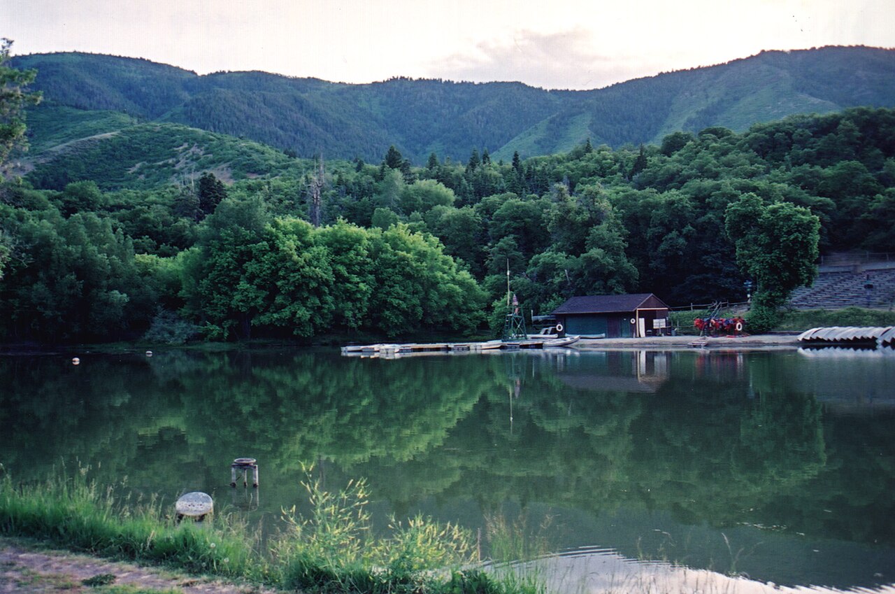 Scope and content: The original finding aid described this photograph as: Original Caption: Maple Dell's boating and swimming pond is nestled among the mountains. Location: Maple D